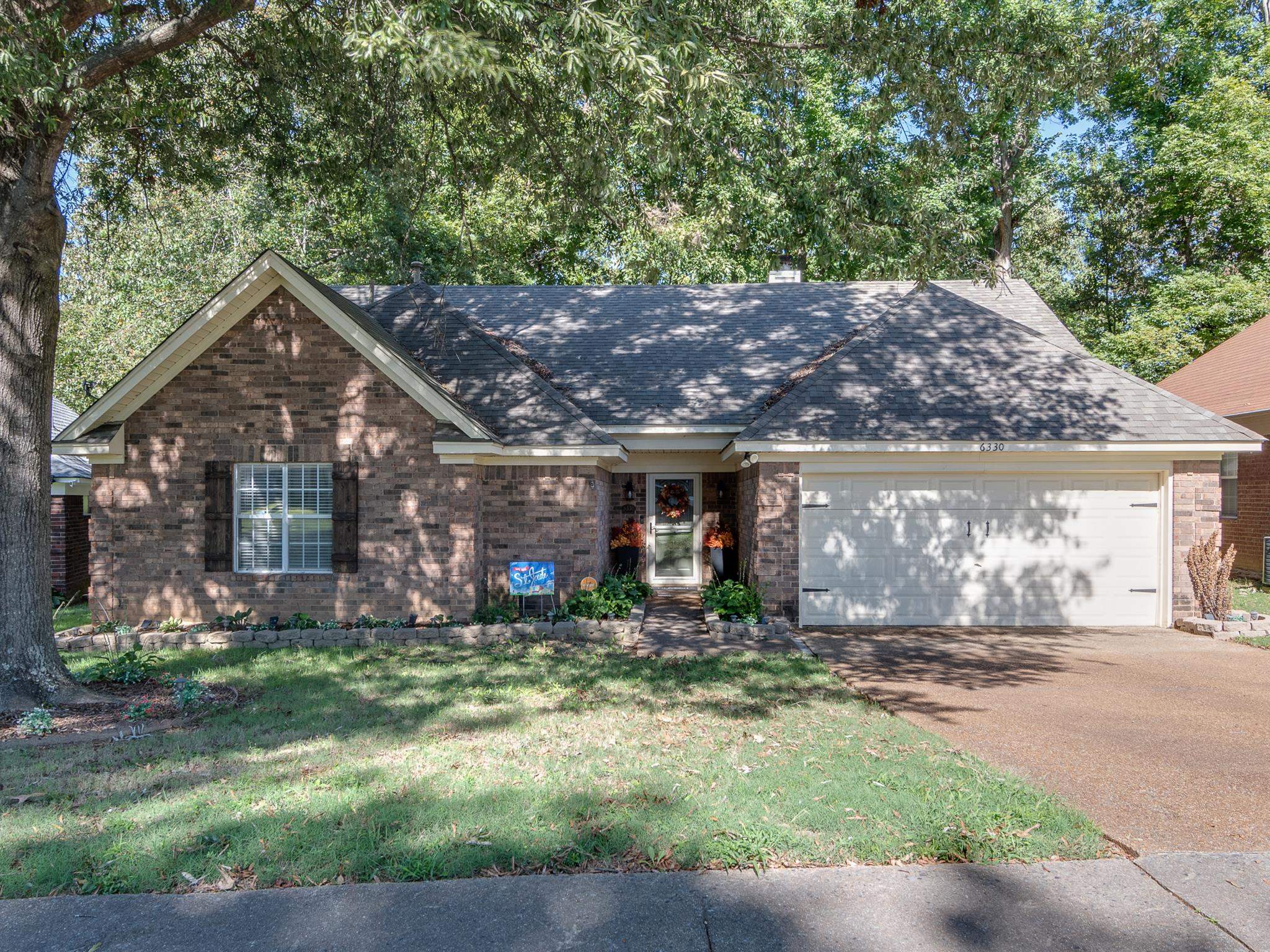 a front view of house with yard