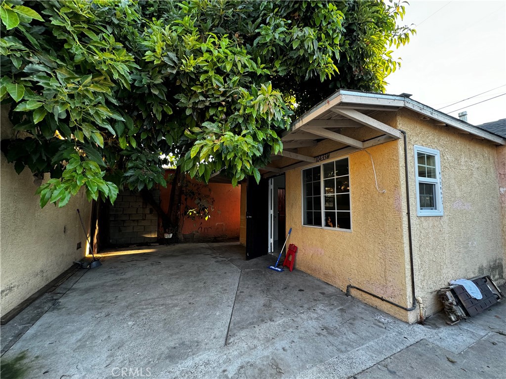 a house with trees in the background