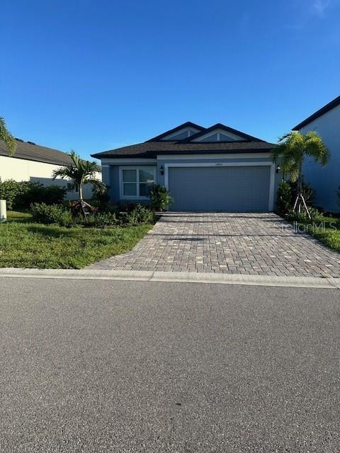 Front view & paved driveway