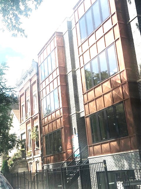 a view of a building from a balcony