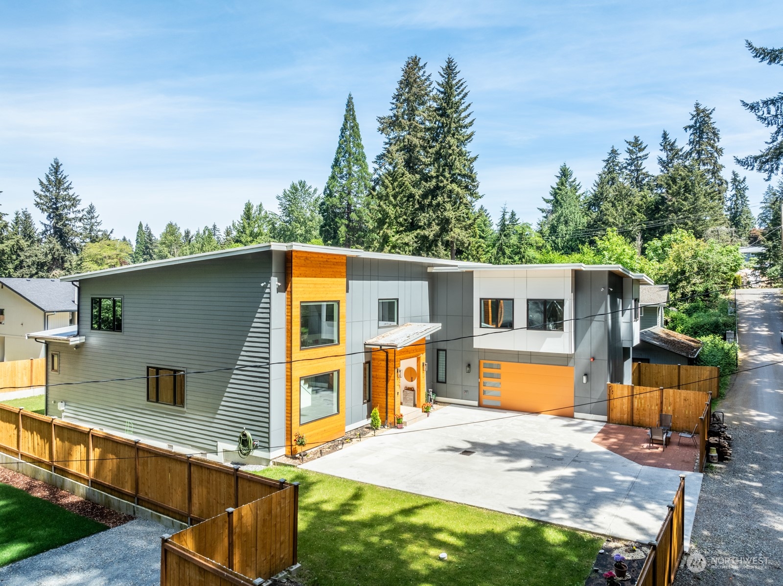 a view of a house with backyard outdoor seating area and barbeque oven