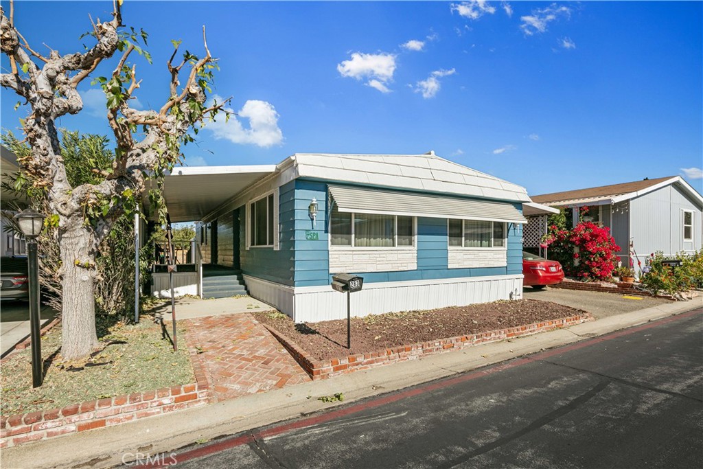 a front view of a house with a porch