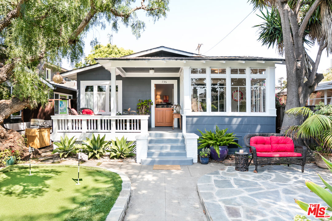 a front view of a house with outdoor space