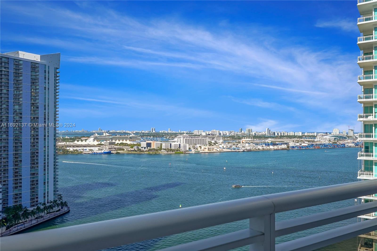 a view of city with ocean