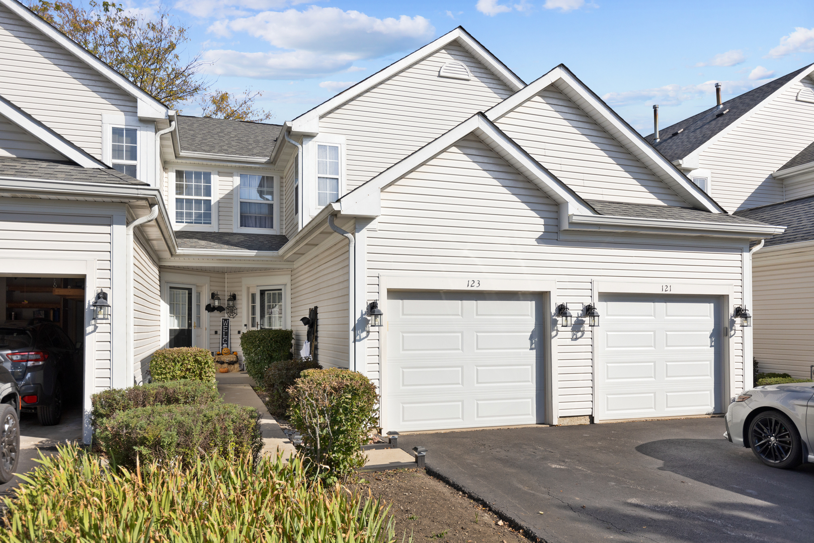 a front view of a house with a yard