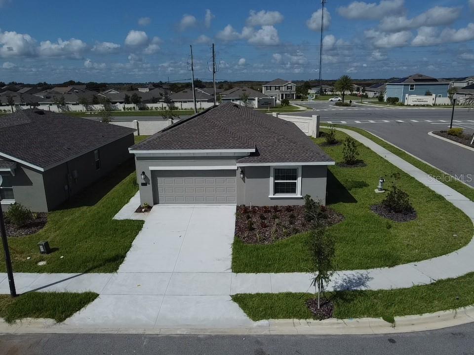 front view of a house with a yard