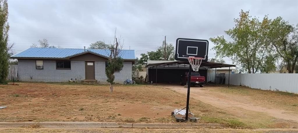 a house view with a backyard space