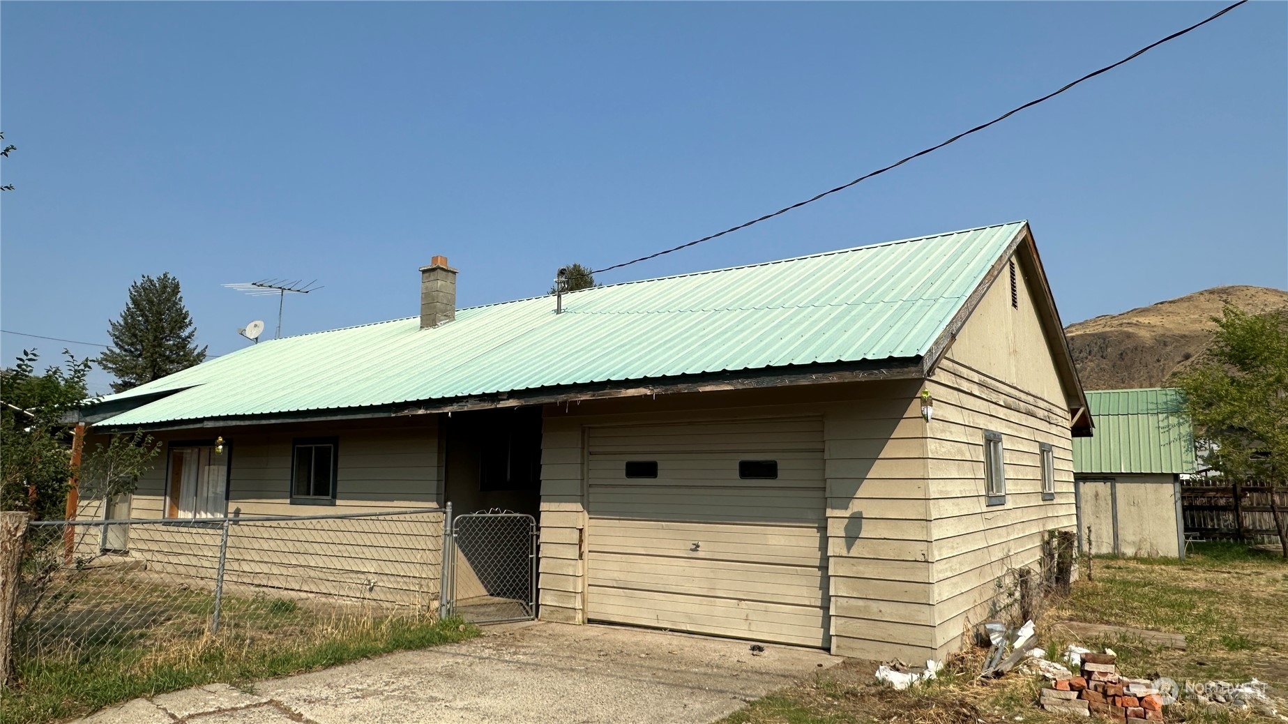 a view of a house with a patio