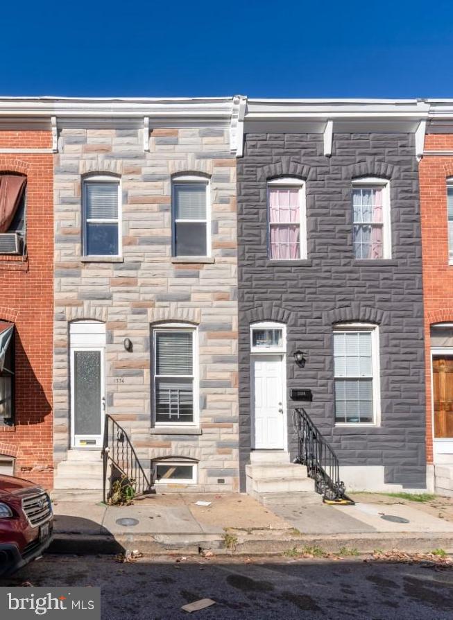 a brick building with a view of the house