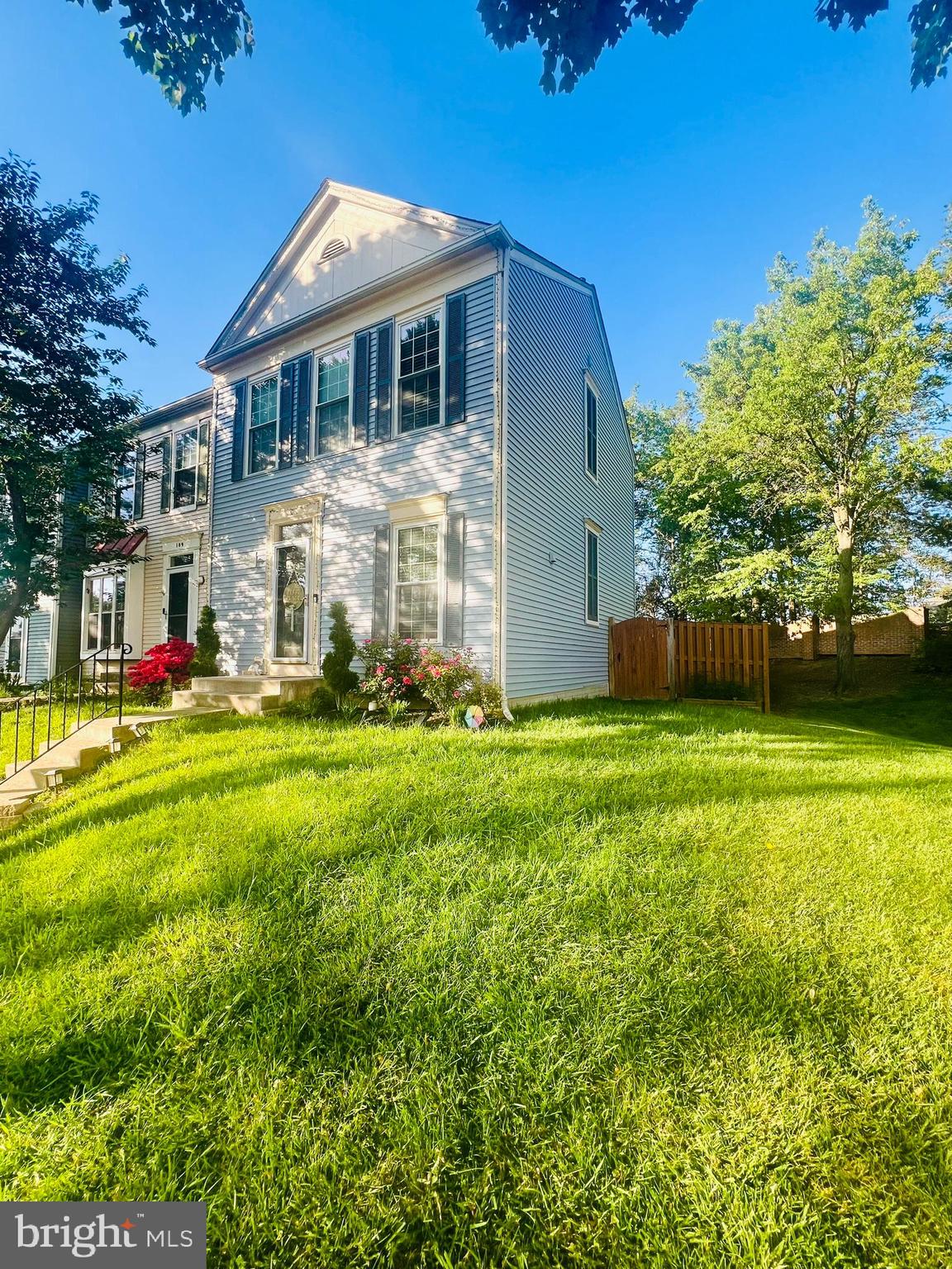 a front view of house with garden