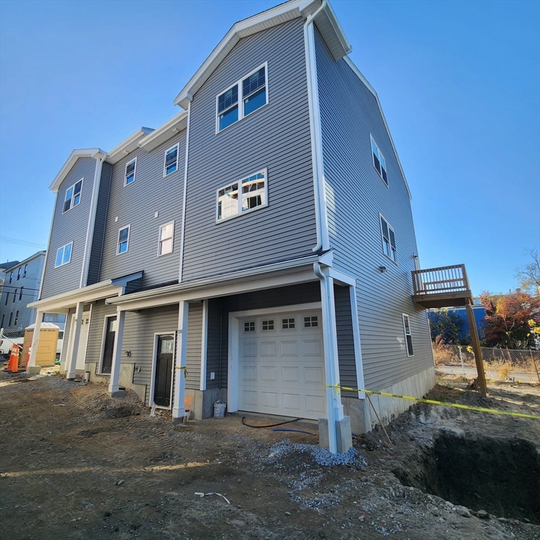 a front view of a house with yard