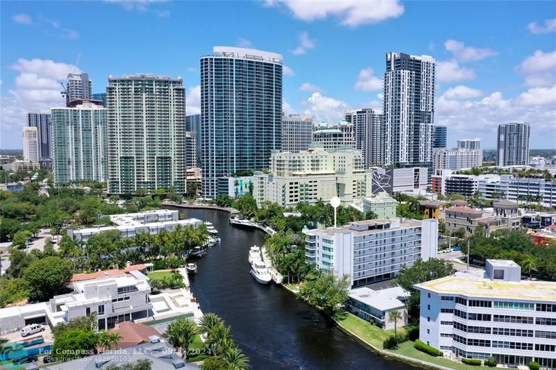 a view of a city with tall buildings