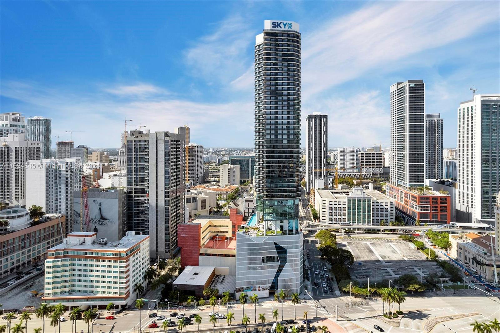 a view of city with tall buildings