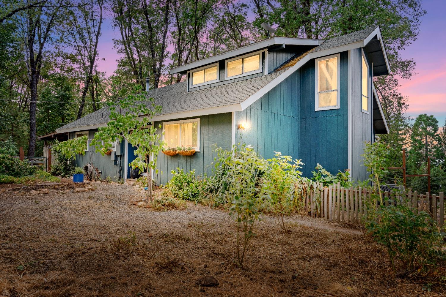 a front view of a house having yard