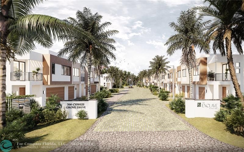 a view of multiple houses with palm trees