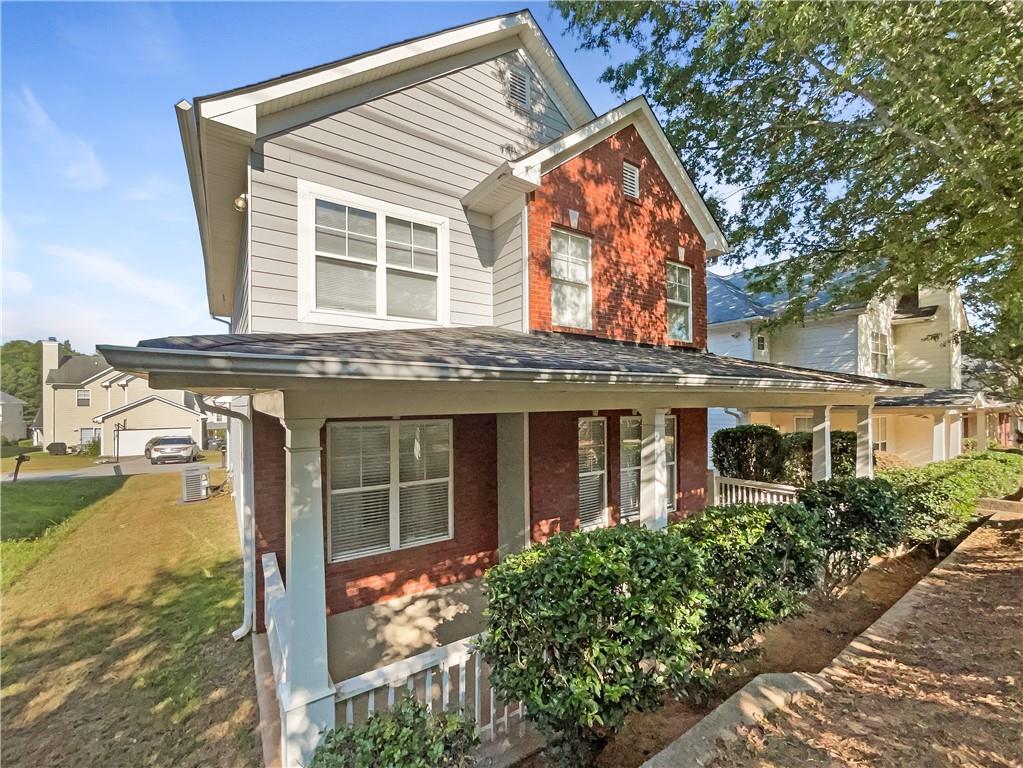 front view of a house with a yard