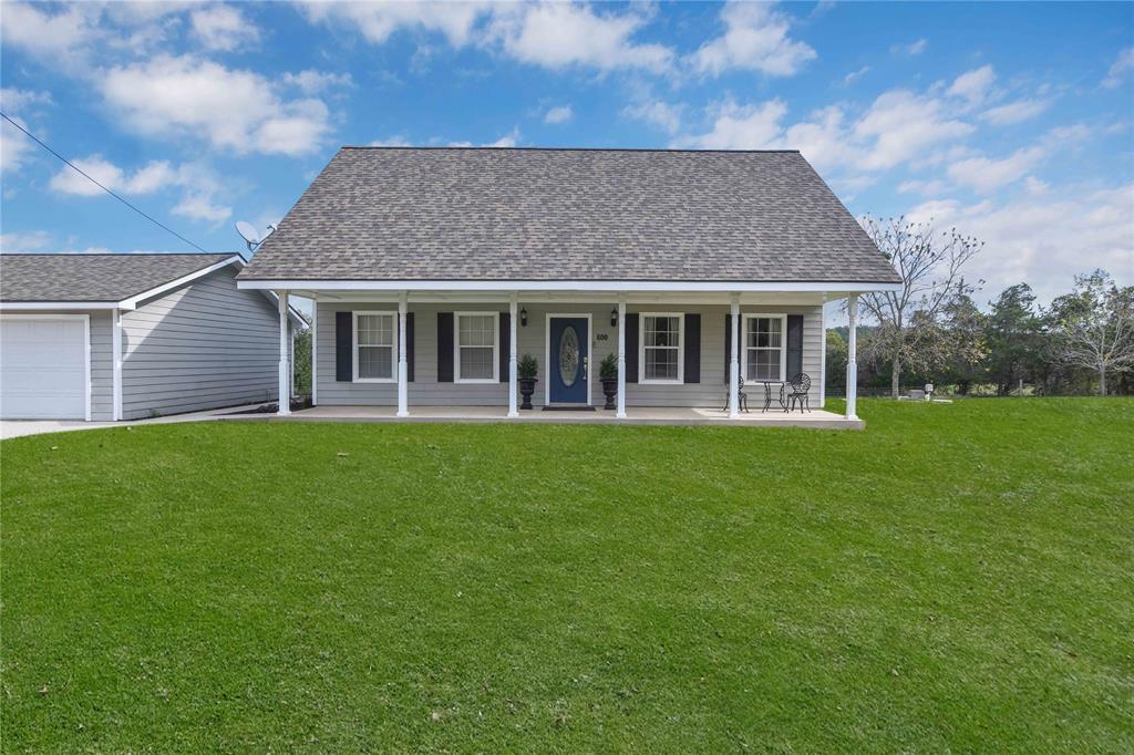 front view of house with a yard