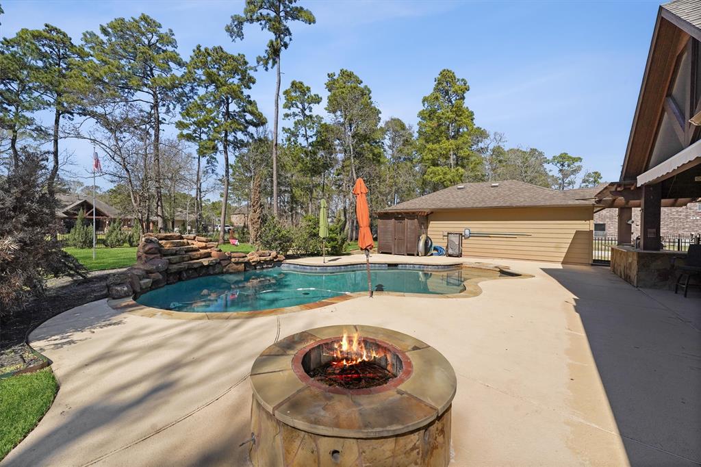 a view of a swimming pool with a yard