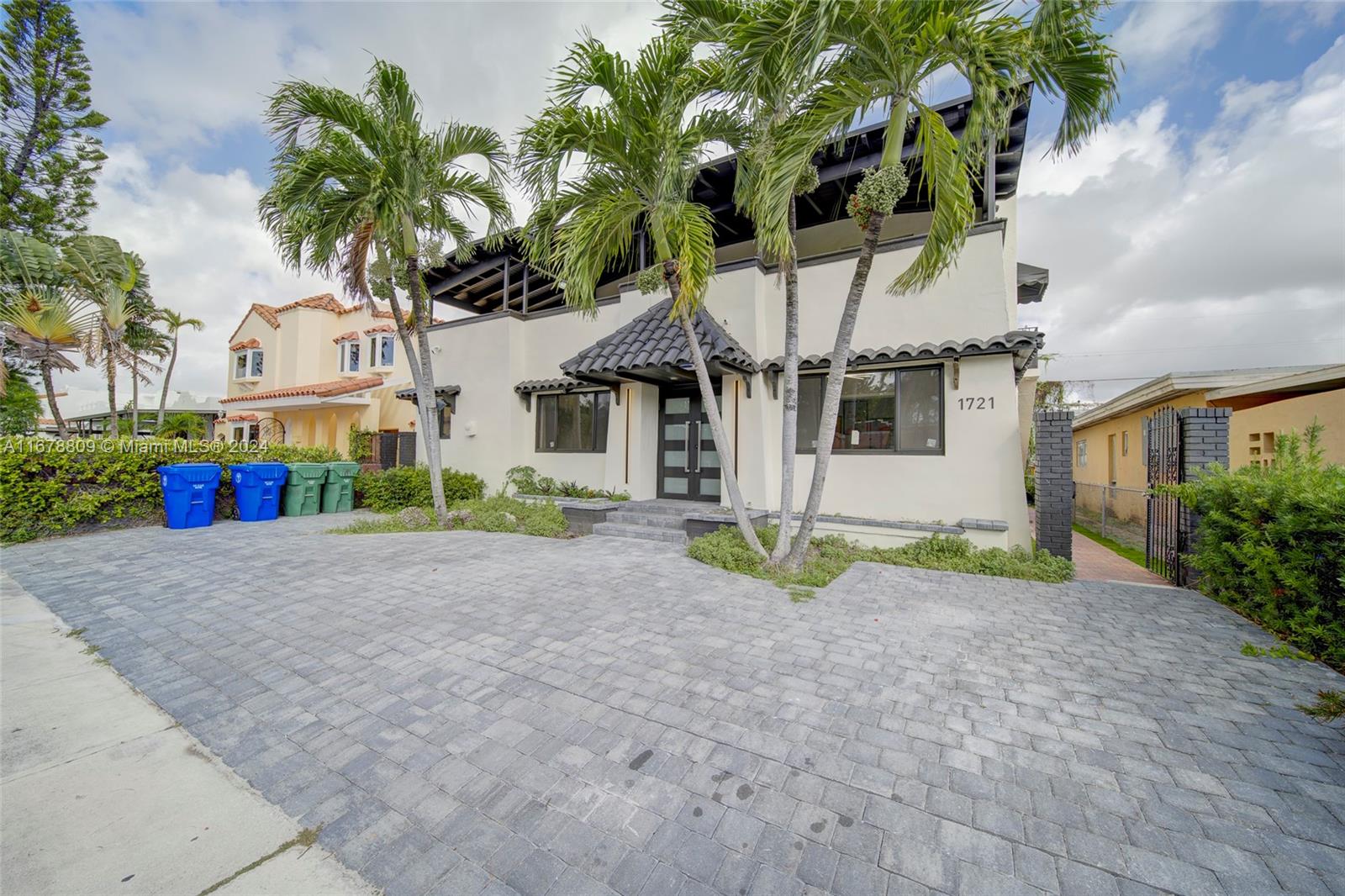 a house with a tree in front of it