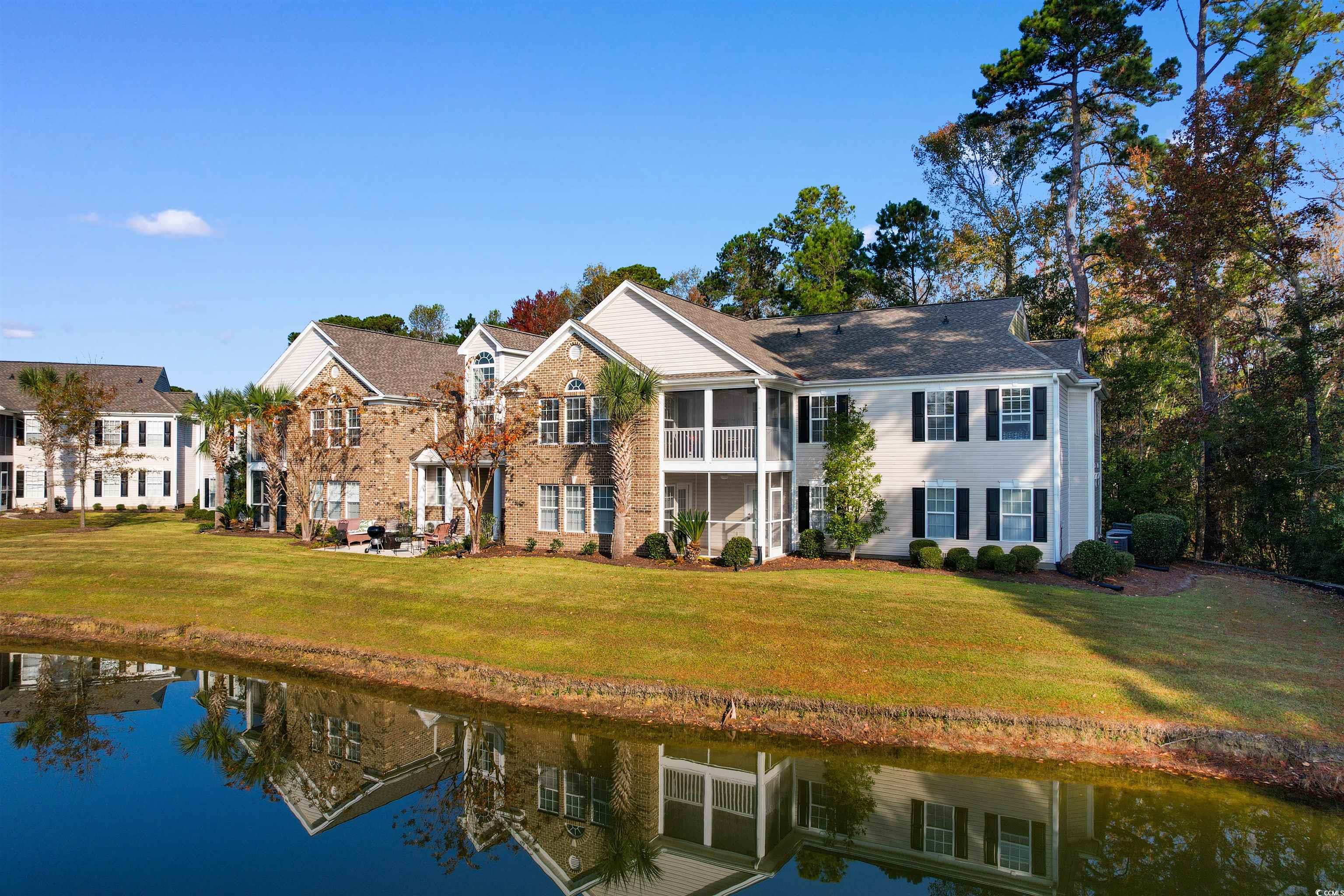 View of front of home featuring a water view, a fr