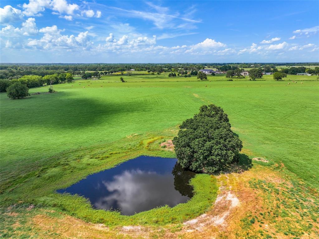 a view of a golf course with a building