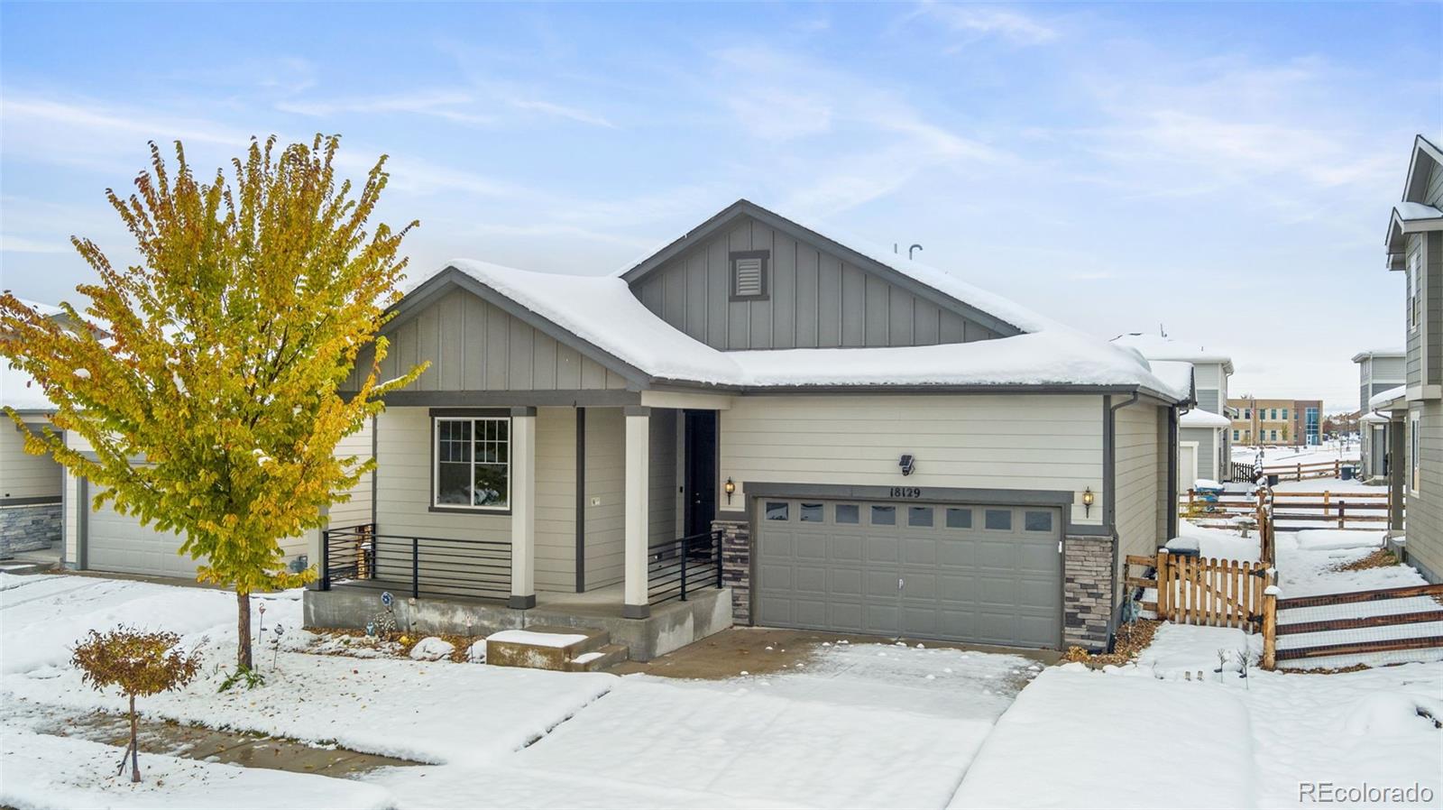 a front view of a house with a garage