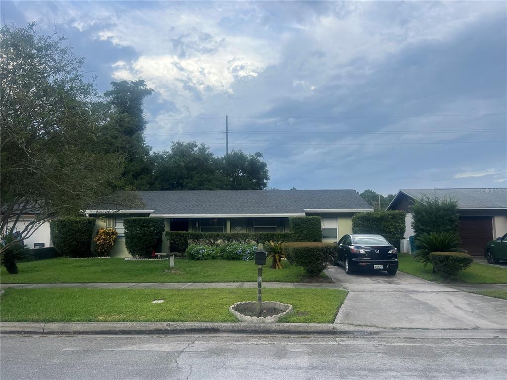 a house view with a garden space