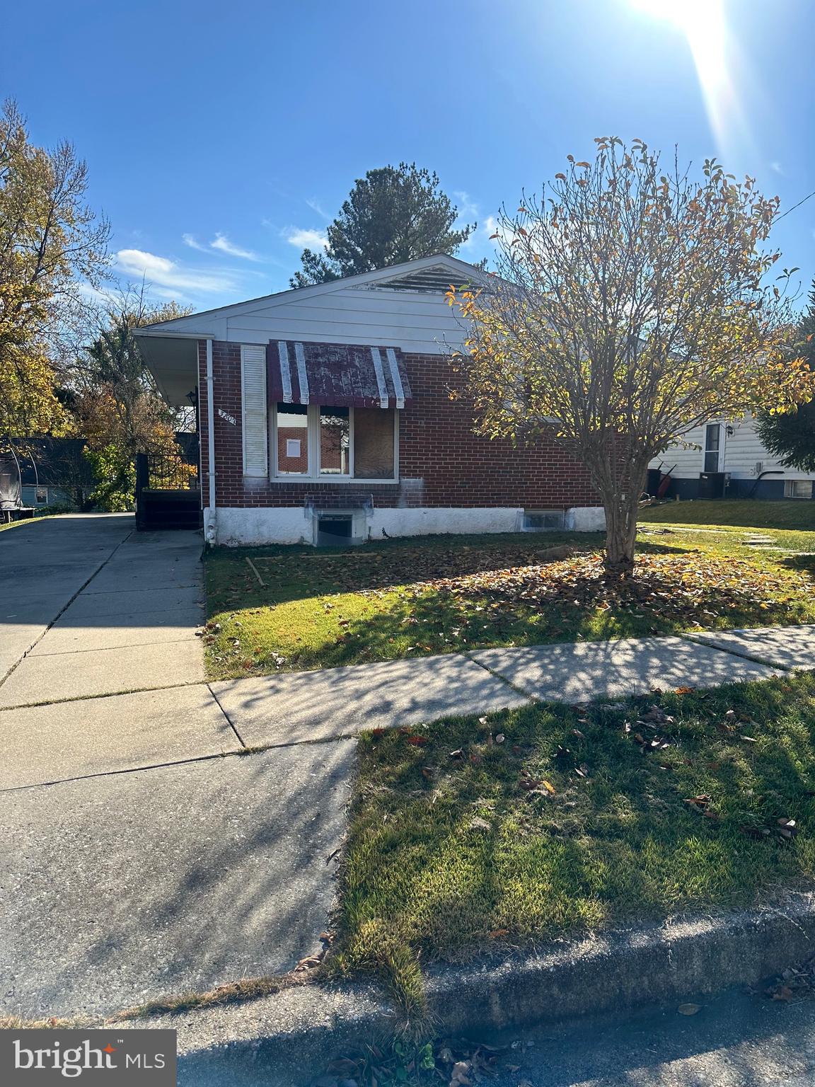 a view of a house with pool and yard