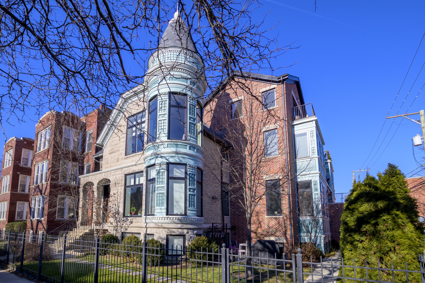 a view of a building with a yard