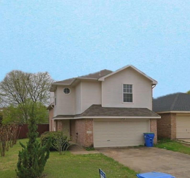 a front view of house with yard