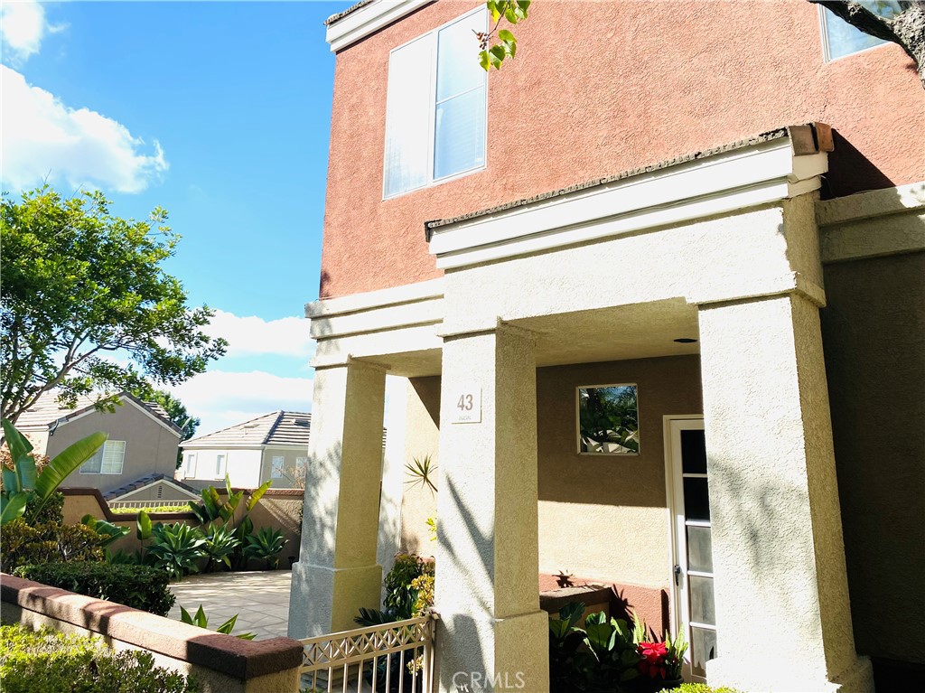 front view of a house with a street