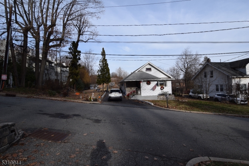 a view of a town with barn house