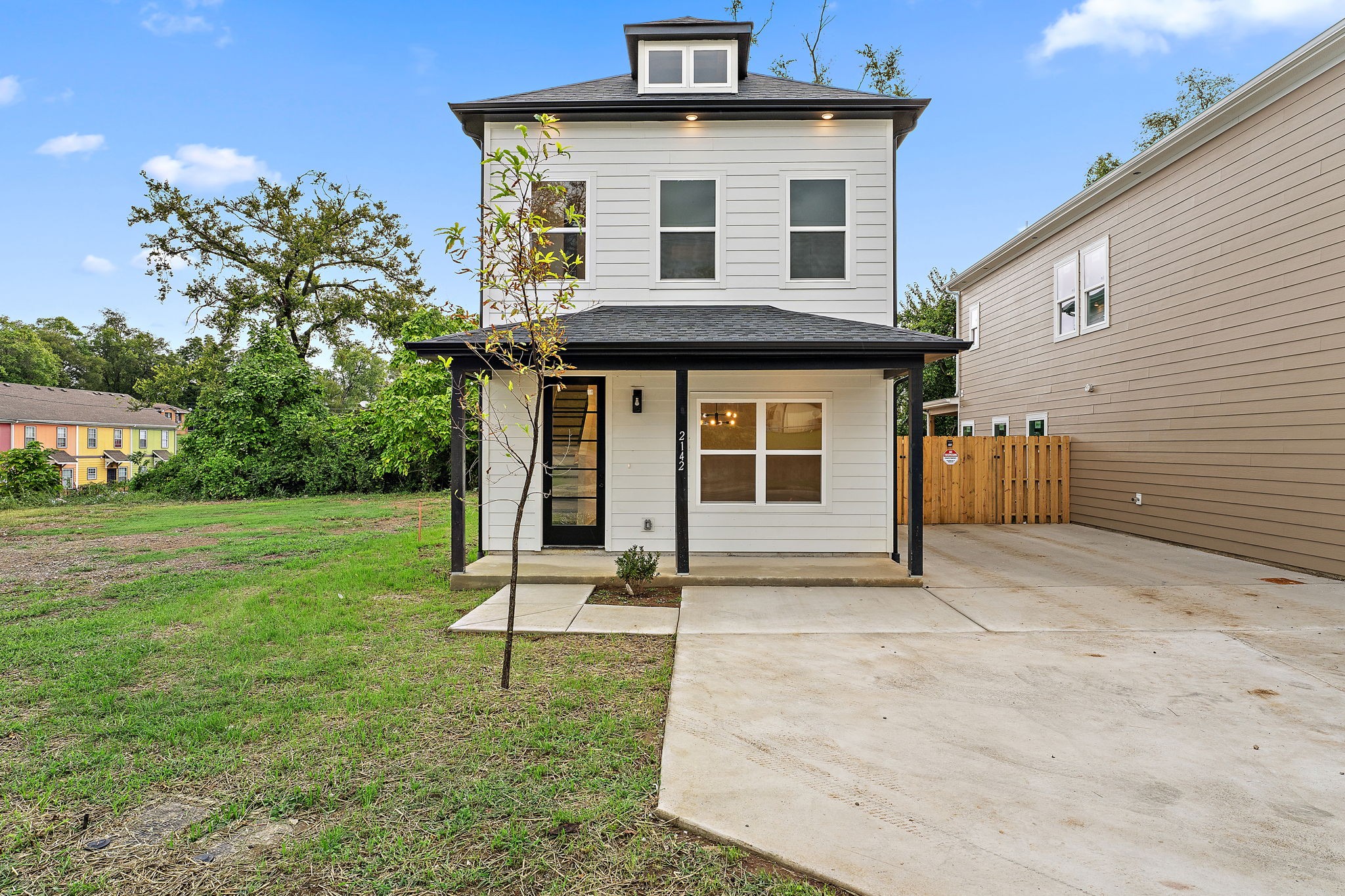 a house with garden in front of it