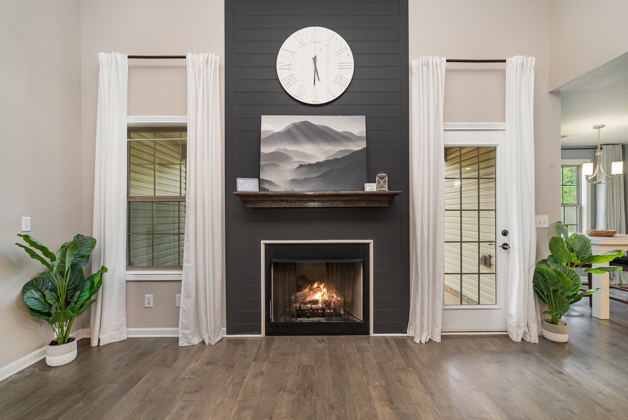 Gather here! This fireplace is the heart of the home, bringing warmth and charm to every moment.