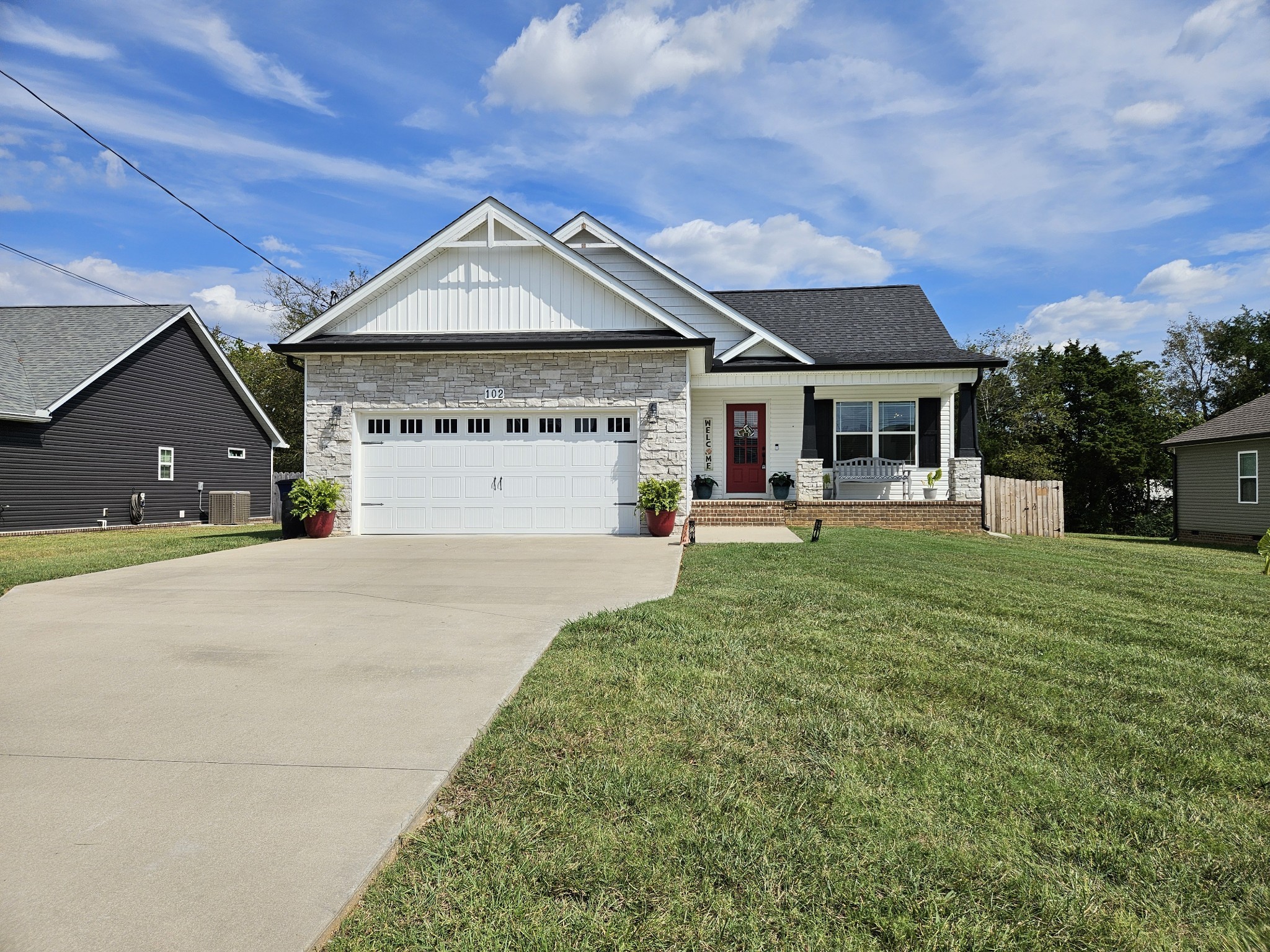 a view of house with outdoor space and porch