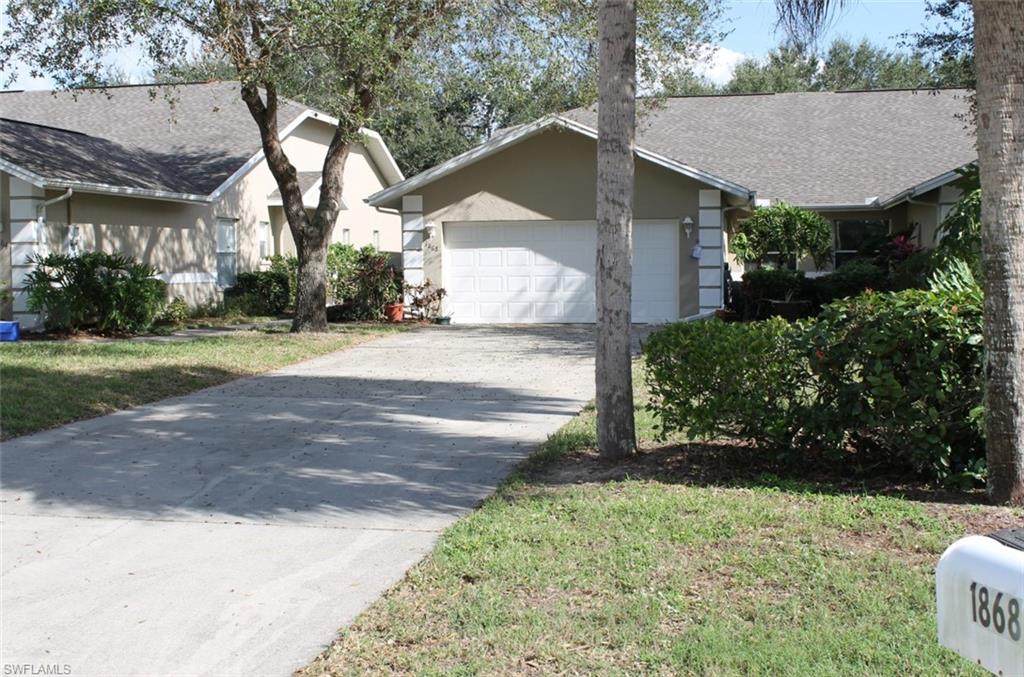 View of home's exterior featuring a garage