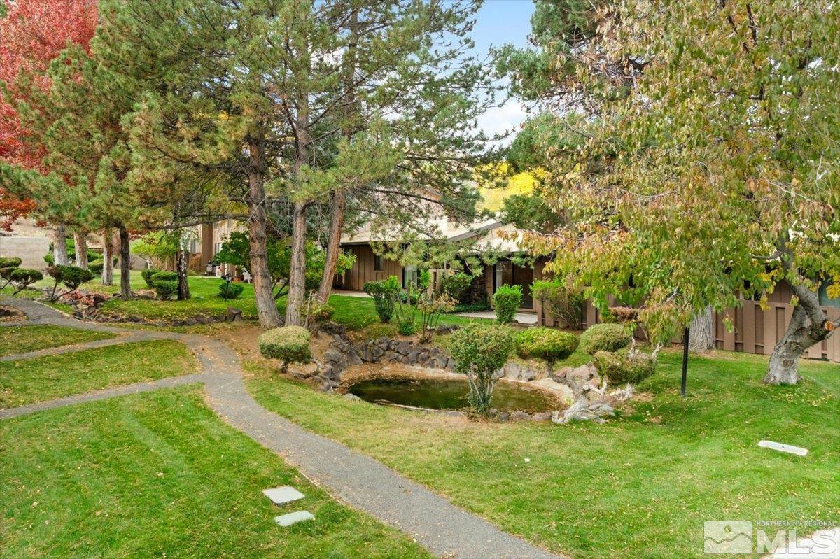 a view of backyard with green space