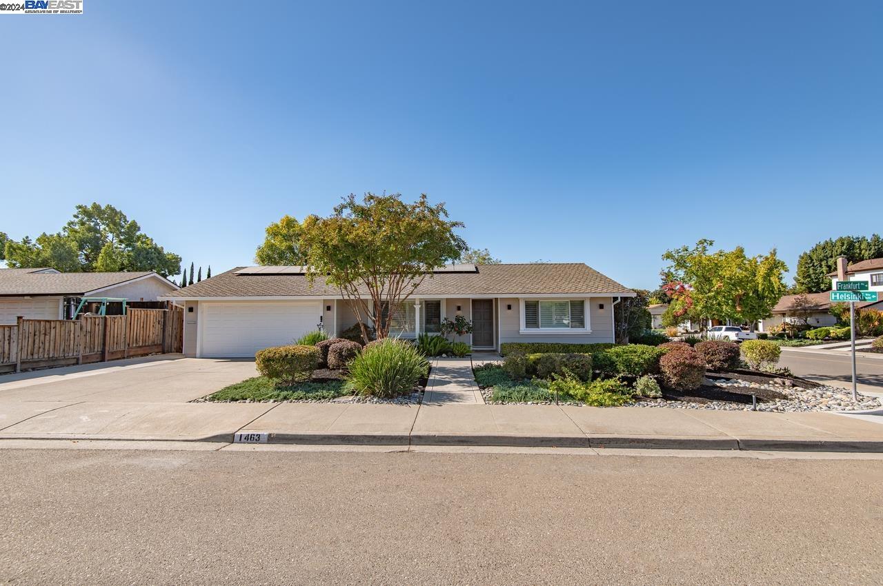 front view of a house with a small yard