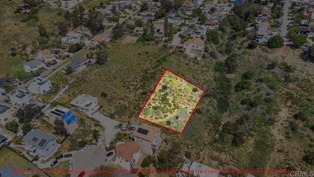 an aerial view of residential house with outdoor space