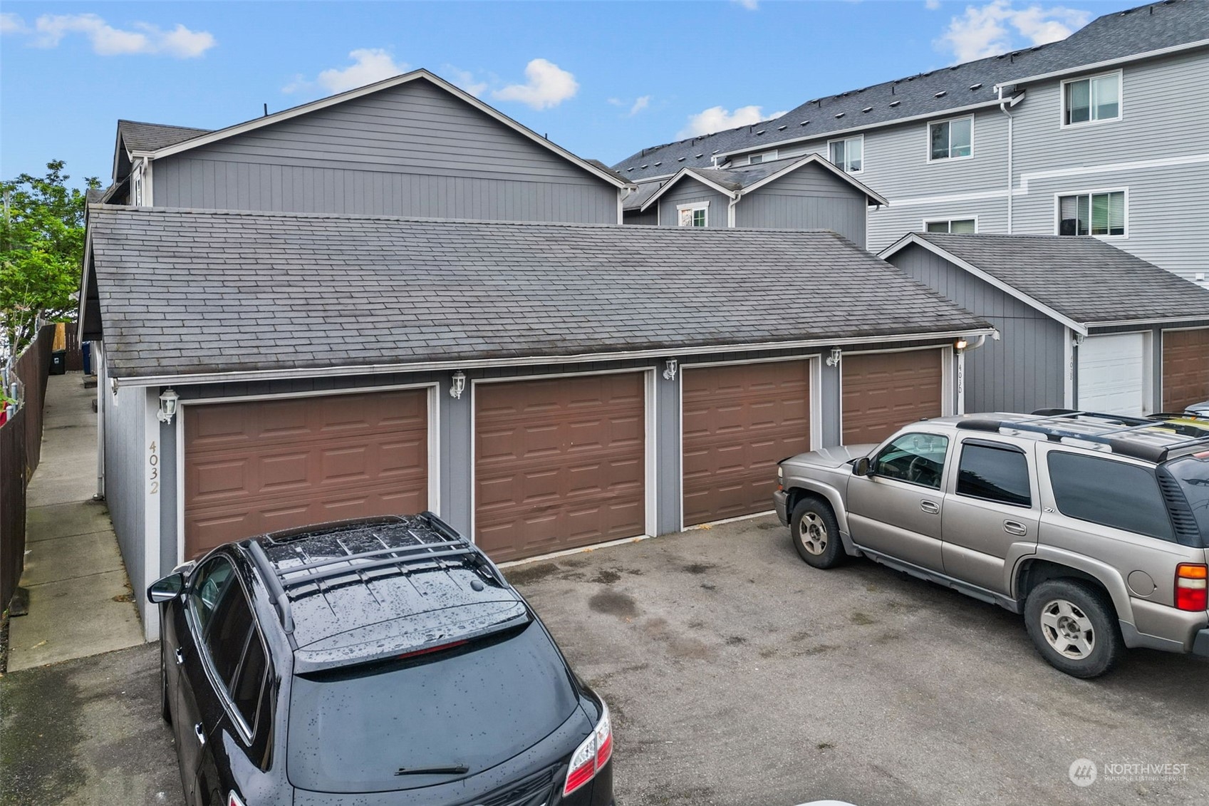 a view of a car in front of house