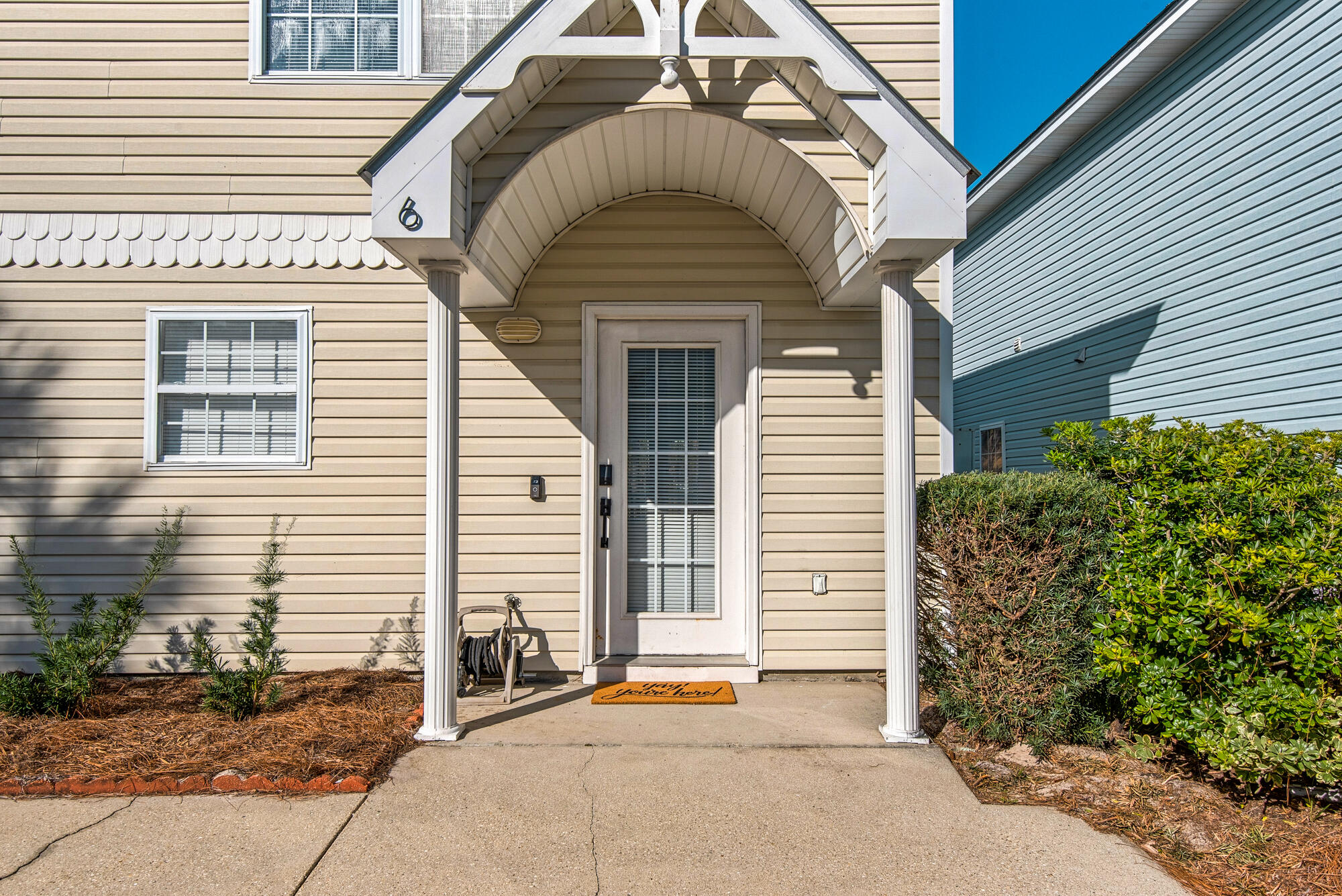 a front view of a house with a garage