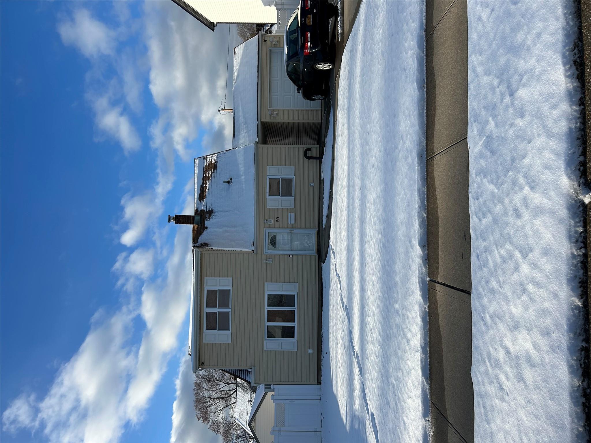 View of front of home with a garage