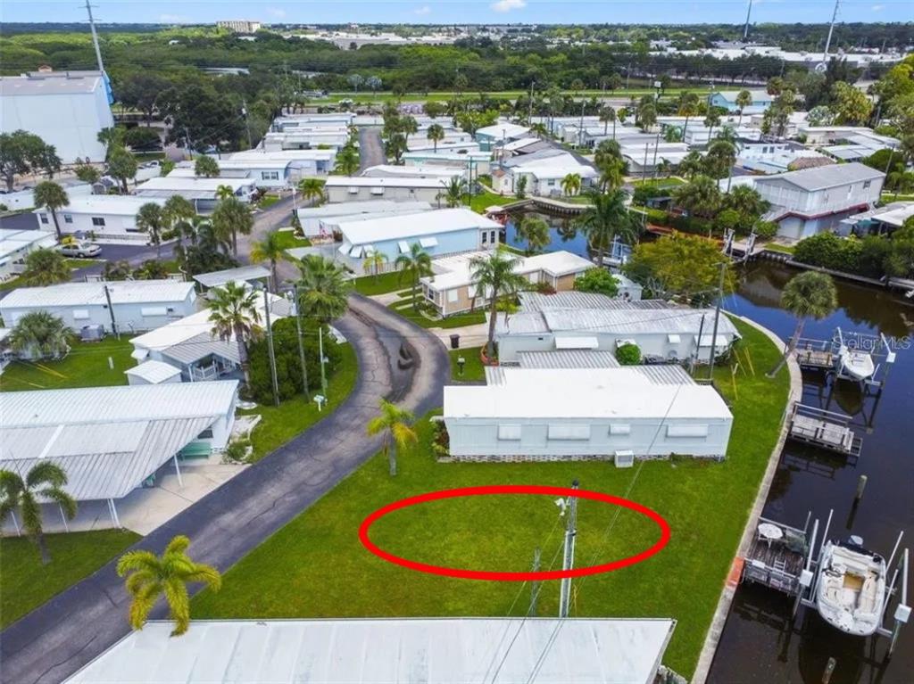 an aerial view of a house with a swimming pool