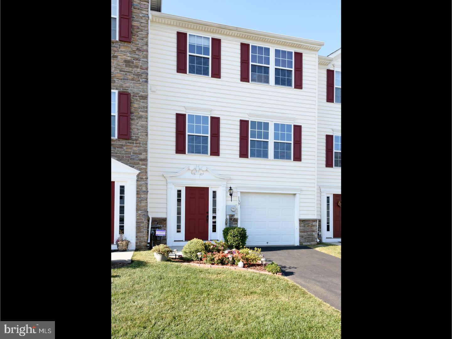 a front view of house with yard