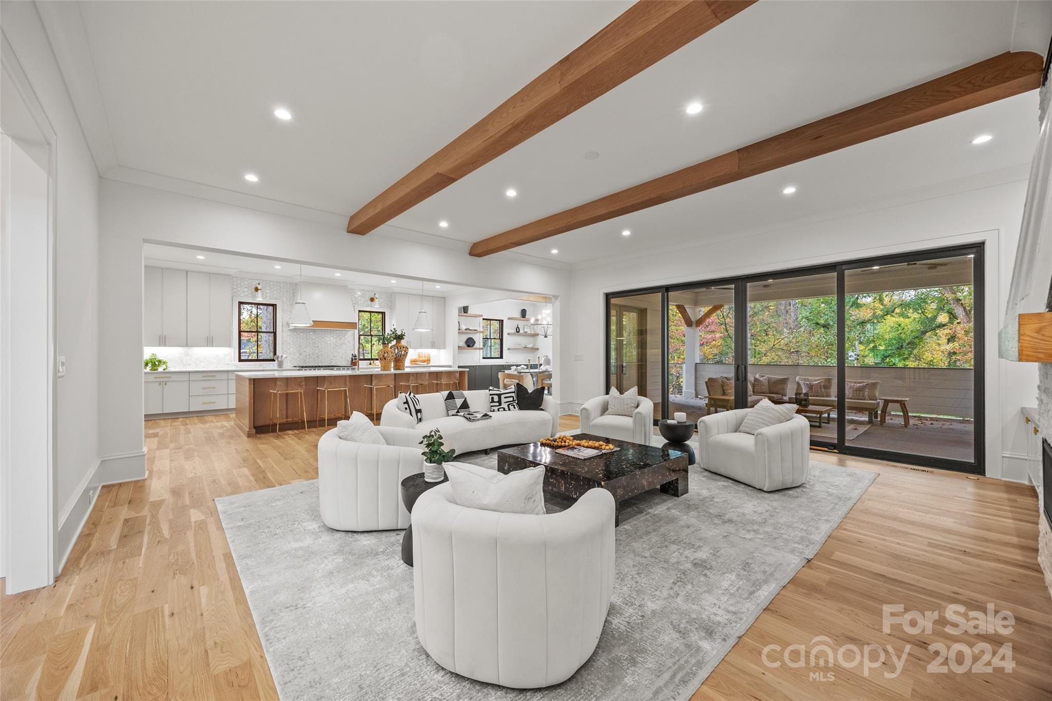 a living room with furniture and a table