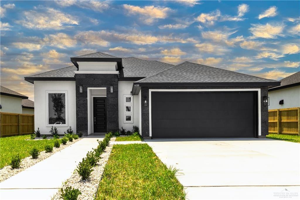 Prairie-style house with a garage