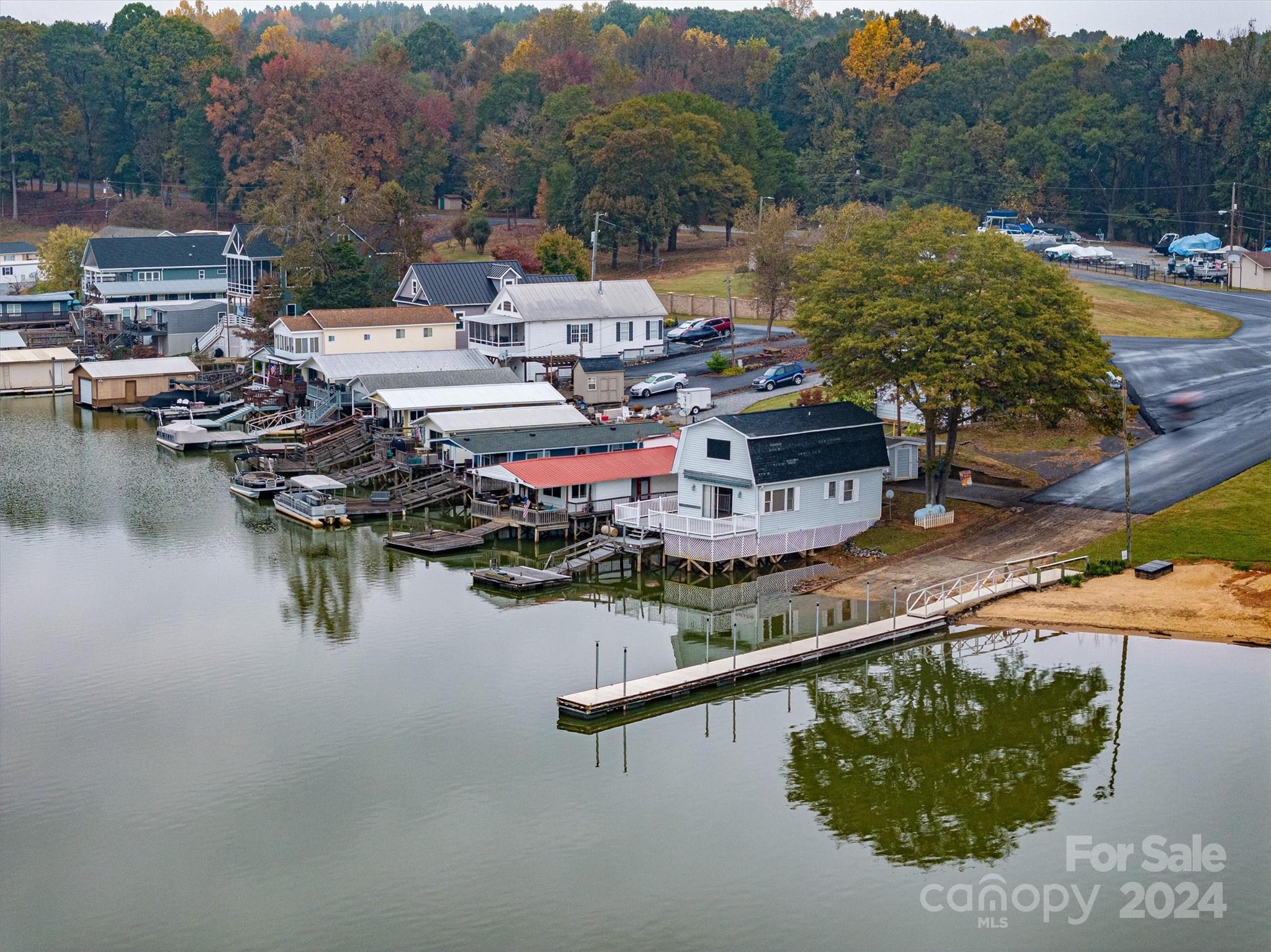 a aerial view of a house with lake view