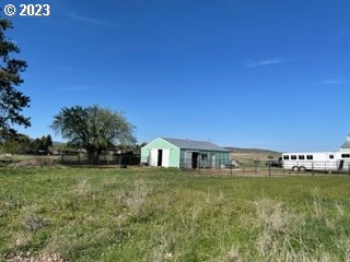 a view of house with outdoor space