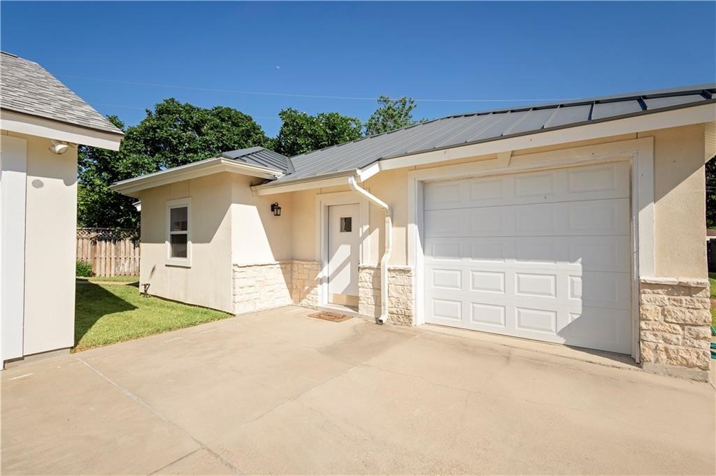 a view of a house with a garage