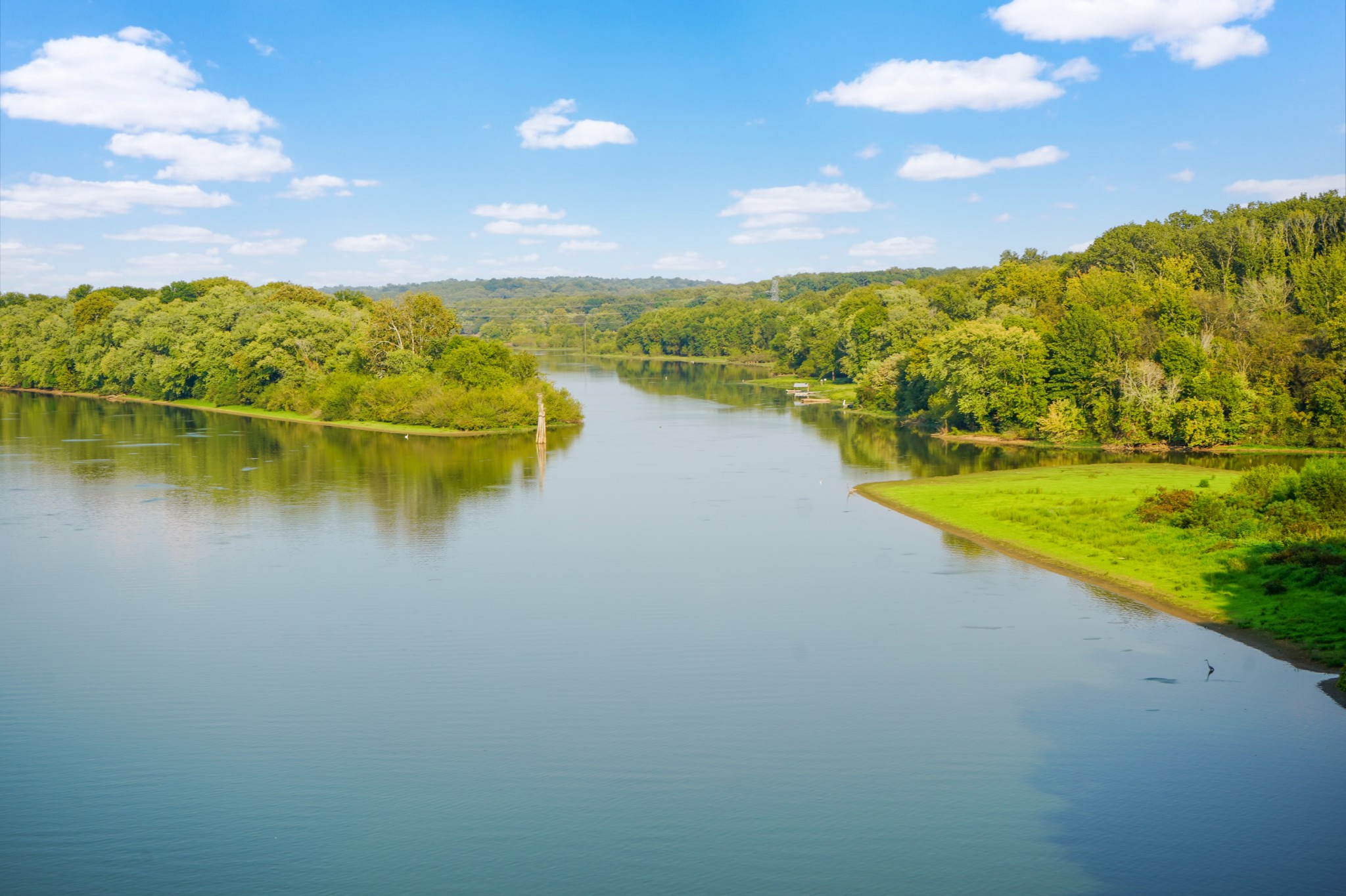 a view of a lake with a big yard